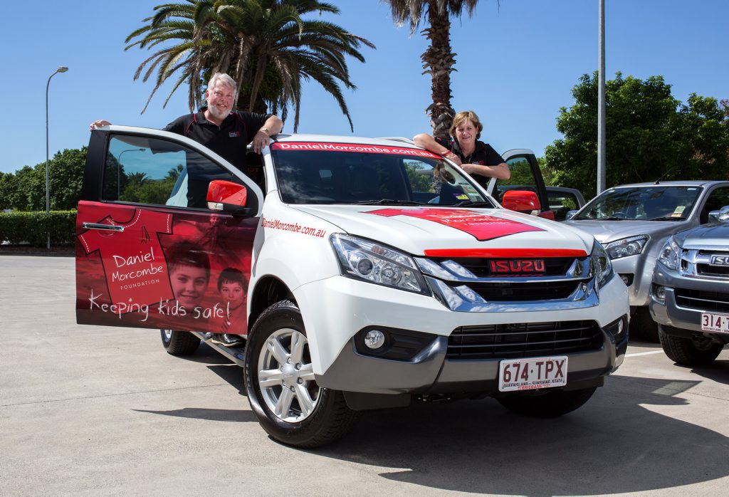 Bruce and Denise Morcombe with the new Isuzu MU-X. Bruce and Denise Morcombe with the new Isuzu MU-X.